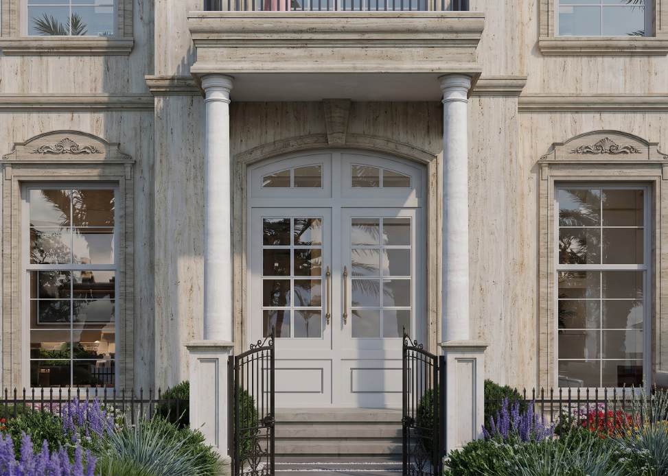 Grand entrance of Villa Type A with columns and white double doors