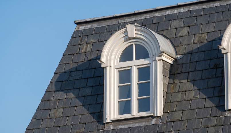 Dormer window set into the slate roof of Villa Type B