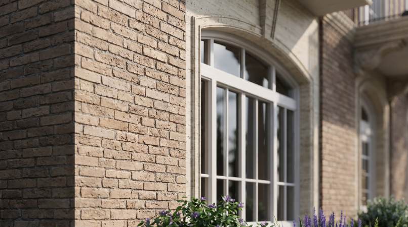 Arched window on the brick facade of Villa Type C
